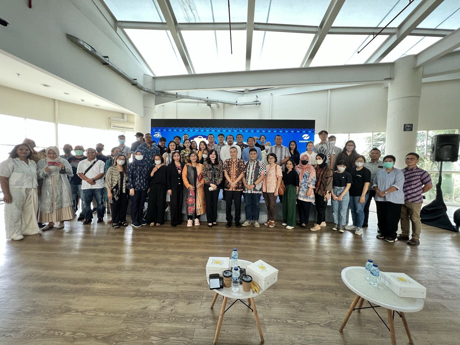 Skandara team and partners group photo at a TransJakarta event